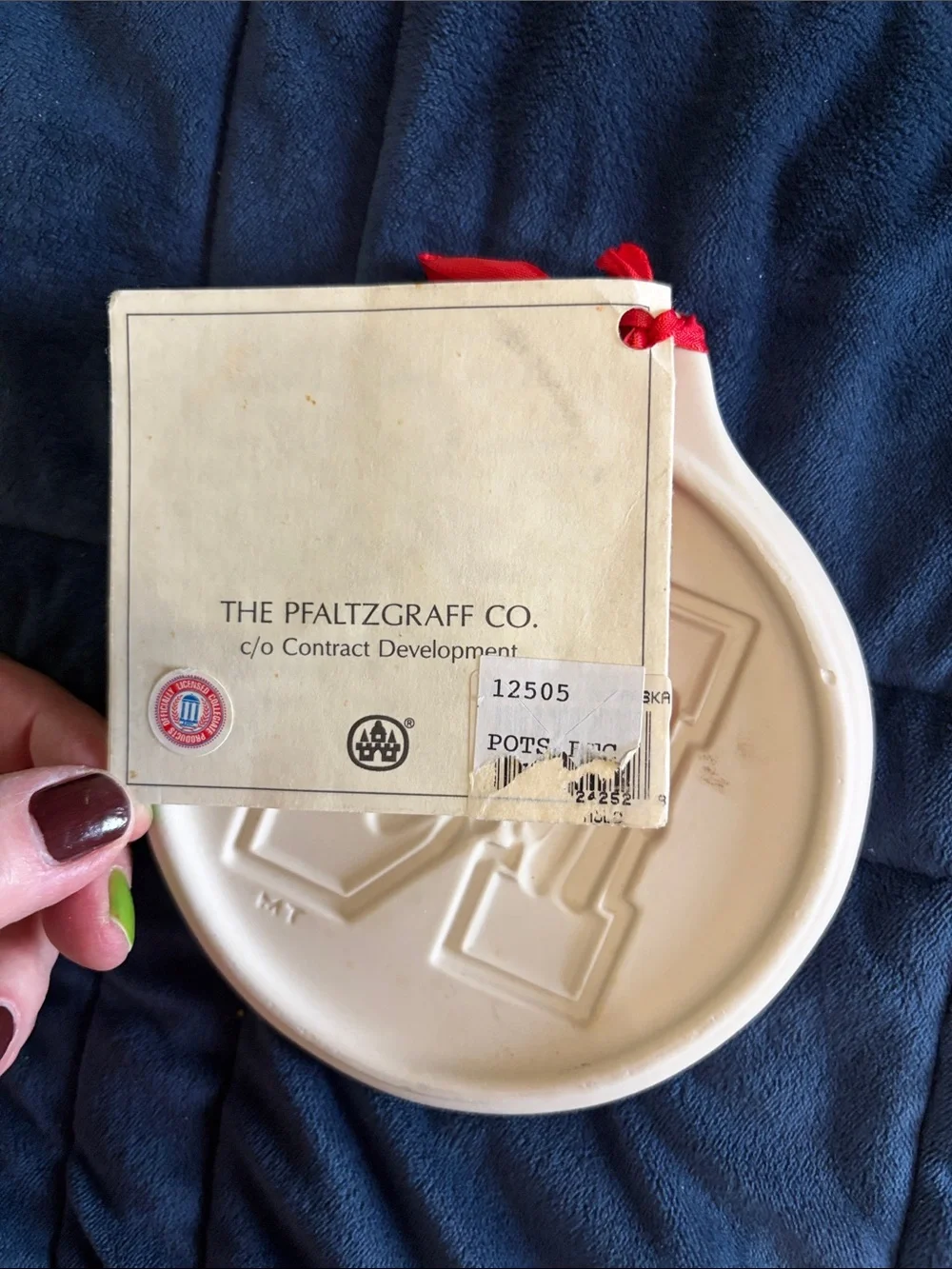 Pfaltzgraff White Nebraska Huskers Cookie Mold with Red Ribbon